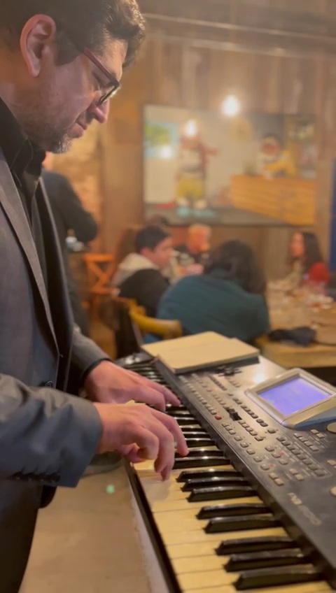 Neptaly playing keyboard